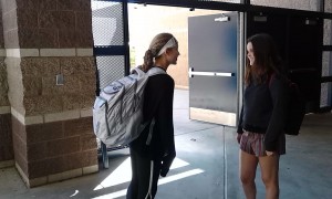 Discussing their afternoon plans, Elyssa Fair, 9, and Juliette Cahon, première année, determine how they will fit their schedule around Fair’s lacrosse game and make time to hang out with other French foreign exchange students later. Photo by Faith Evans