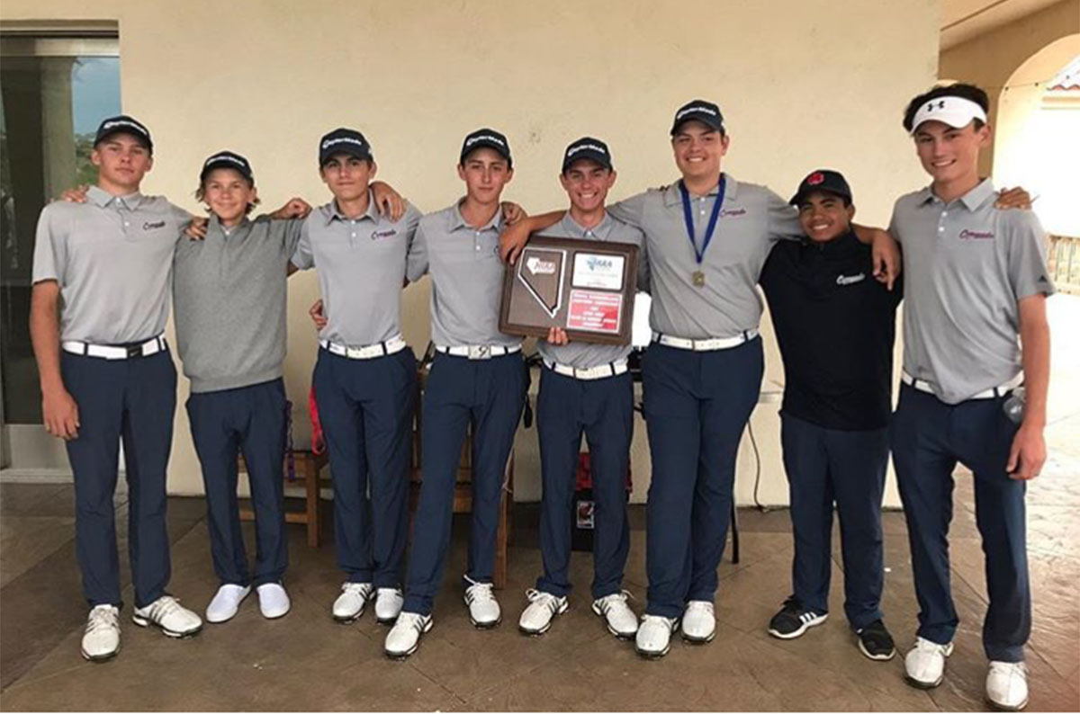 Finishing first, the men’s golf team poses for a photo following their victory. Photo courtesy of Coach Sawaia