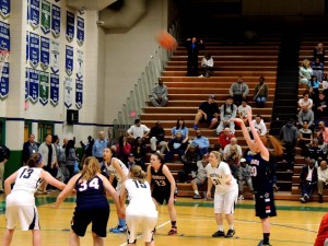 Karlie Thorn, senior, shoots for the extra point in the playoff game against Foothill at Green Valley last night. The ladies lost