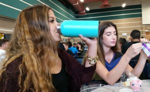 During lunch, Cambree Kalana, 11, enjoys a cold, refreshing sip of water from her Hydro Flask. Photo by Saveria Farino