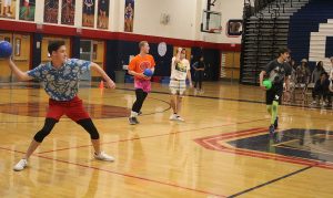 Aiming towards his next target in the championship, two time winner Andrew McKinney, senior, prepares a throw to get out his competitor. Photo by Saveria Farino