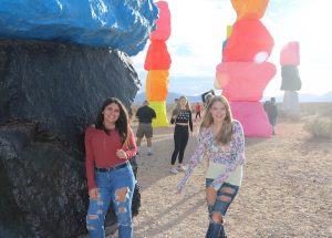 During their visit to Seven Magic Mountains, Marina Moraitis, 10, and Ashleigh Liebig, 10, pose for a photo in front of the sculptures. Photo courtesy of Ashleigh Liebig