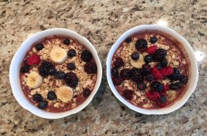 Mouthwatering açaí puree, decorated with fruit and granola, makes for a great healthy snack. Photo by Rosa Cesareo