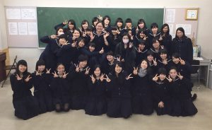 A class photo is taken at Hokusei Gakuen Girls’ Junior and Senior High School with Sae Adachi, 11, and her homeroom classmates. Adachi is the tall girl with the glasses seen grinning in the middle. Photo courtesy of Sae Adachi