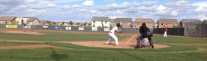 Pitcher Jackson Cofer, senior, throws a strike in order to get the Cougars out of the inning during their game on April 2. (Photo by Jolie Ross)