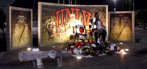 Flowers, notes, and photographs adorn the statue of Jerry Tarkanian located outside the Thomas & Mack on Wednesday, Feb. 18, following the Rebel game against Boise State. (Photo by N. Thompson)