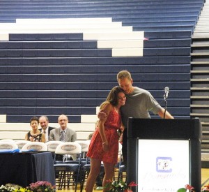 Sara Dort receives female athlete award from Mr. Tondryk. (Photo by Ashly Riches)