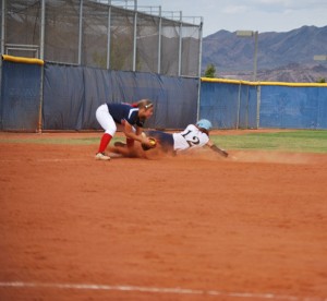 Nicole Hardy, senior, tries to tag out a player at third during Foothill’s senior day on May 7. (Photo by Jolie Ross) 