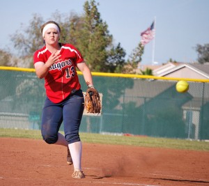 Katie Dawson, senior, pitches during the seventh inning on senior day on Friday, May 9, to get the save. (Photo by Jolie Ross)
