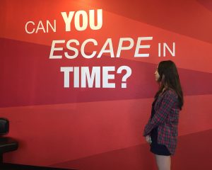 Pondering the question, Sara Seibel, 11, prepares to enter “The Atelophobia” escape room at Countdown Escape Games. Photo by Bekah Denny