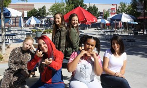 In honor of the upcoming spirit week, members of The Roar staff represent each day, inviting you to participate and show your cougar pride. Photo by Karen Pegueros