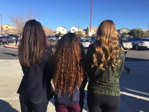 All showing off their unique hairstyles, Katelyn Virgen, Kaylee Heiny, and Olivia Yamamoto, freshmen, embrace their different locks and personalities. Photo by Saveria Farino