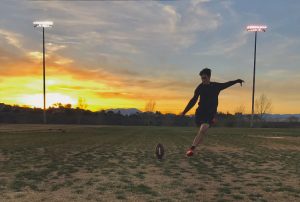 Eye on the ball, Gavin Wale, takes his last kick of the night in preparation for his Sailer Spring camp in California. Photo Courtesy of Gavin Wale