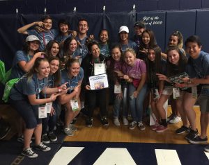 Showing off her award, Swenson shares the moment with her student council. Photo Courtesy of Bianca Weyers