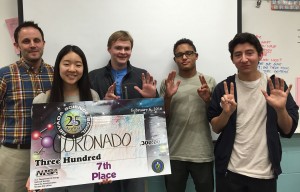 After taking seventh place, the Science Bowl team minus Richard Scow poses with their winning check. Photo by McKenna Cooley