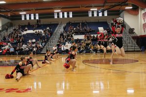 Dominating the audience’s attention, the Cougarettes performed their pom routine, taking home first place. Photo by Karen Pegueros