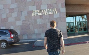 Walking up to the DMV doors, Brenden Bunker, 10, stresses about his upcoming driving exam. Photo by Karen Pegueros