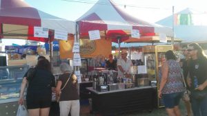 On the hunt for delicious desserts, locals stop at an inviting booth to purchase gelato and cannolis. Photo courtesy of Tracy Douglas