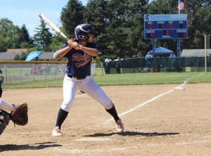Up at bat, Sophia McCann, 11, looks for a weak point in the outfield. Photo courtesy of Michael McCann