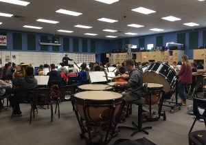 In their fifth period, Mr. McCracken passionately instructs the Concert Band. Photo by McKenna Cooley