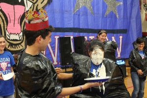 During a trivia game, Shawn Brown, 12, got to pie Ms. Burrows after answering a question correctly. Photo by Karen Pegueros